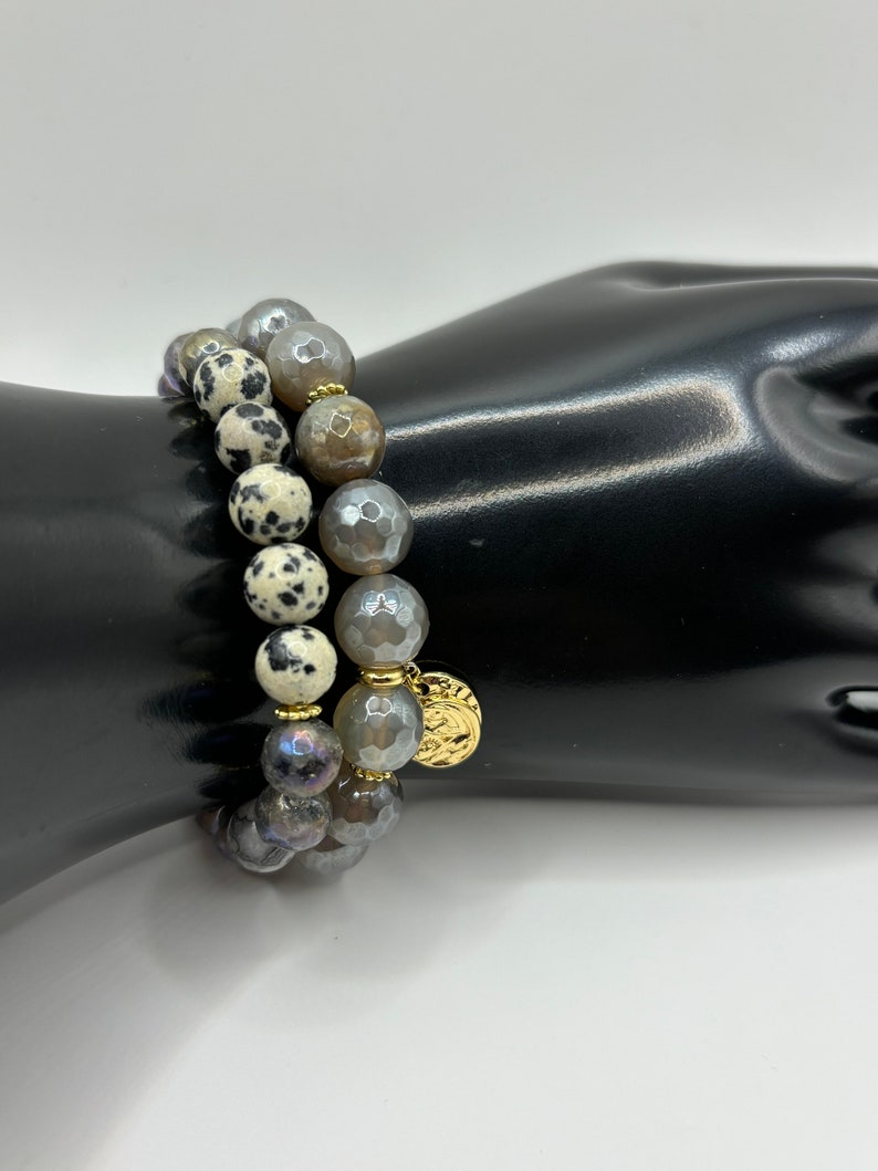 Set of 2 stunning faceted grey beads with hints of gold. This custom made piece is eye catching! Can be personalized!